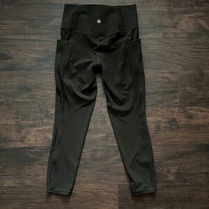 Athleta salutation stash mesh 7/8 tight. Brownish-ish in color.